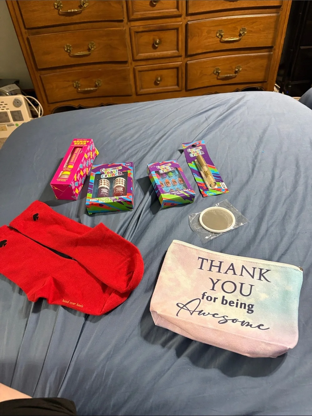 'Pouch with mirror, socks, Cinnamon Toast Crunch items and Trader Joe’s lip duo - Picture 9 of 11